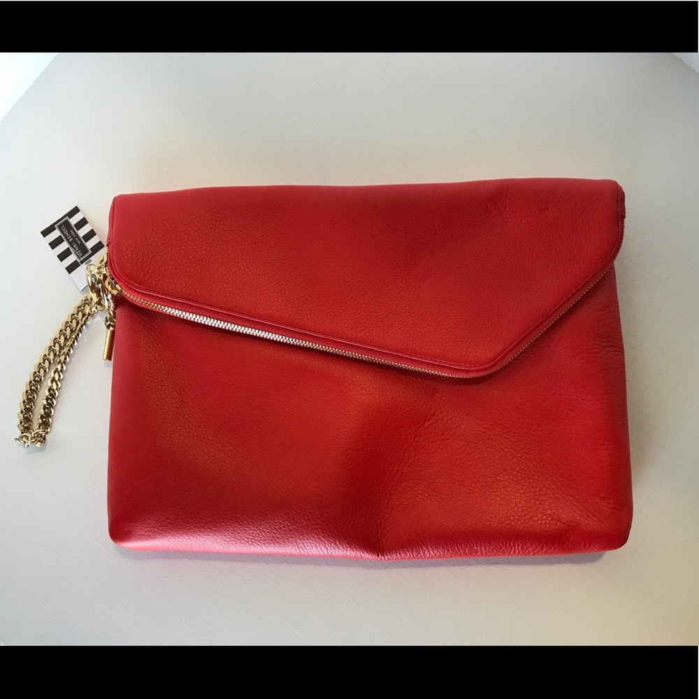 Henri Bendel Debutante Orange Leather Clutch.